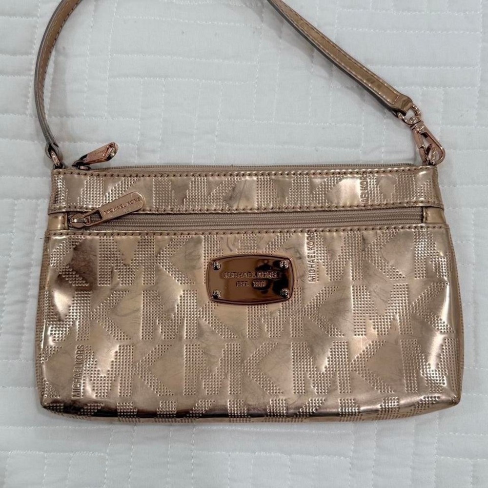 Michael Kors Jet Set Travel rose gold metallic logo wristlet